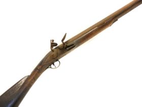 Flintlock shotgun by Moore, 40 inch barrel with flaring muzzle, approximately 14 bore, flamed ash