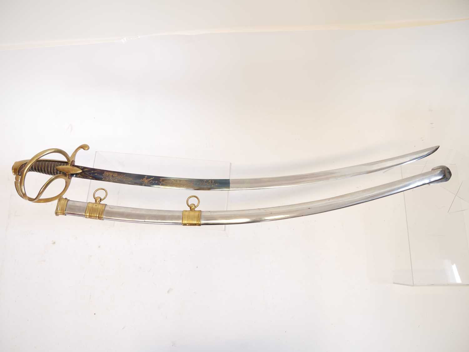 Reproduction copy of a French Cavalry sabre, with blue and gilt etched blade. Buyer must be over the - Image 2 of 7