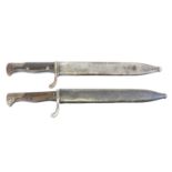 Two German WWI S.98/05 short butchers bayonets and scabbards, both by Mauser with factory stamps