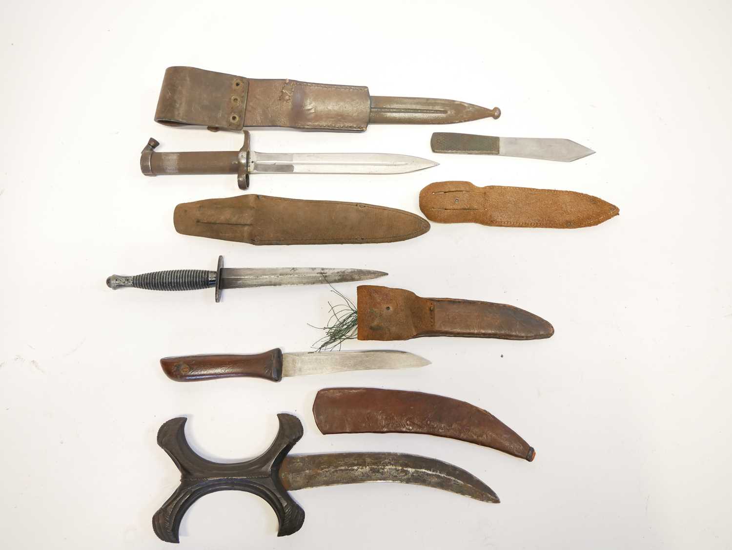 Collection of knives, to include a Fairbairn Sykes dagger, a Hadendoa warrior's dagger, curved - Image 10 of 14