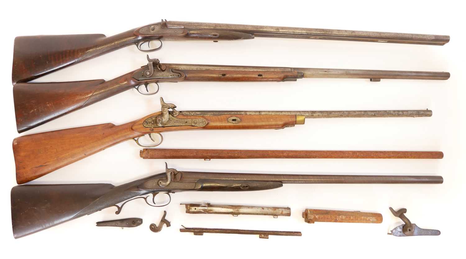 Four percussion shotguns for restoration, one a double barrel, the other three single barrels one by