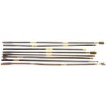 Eight good quality ebony and rosewood cleaning rods, some fitted with jags, mops and brushes.