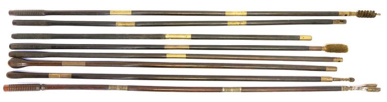Eight good quality ebony and rosewood cleaning rods, some fitted with jags, mops and brushes.