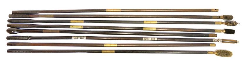 Eight good quality ebony and rosewood cleaning rods, some fitted with jags, mops and brushes.