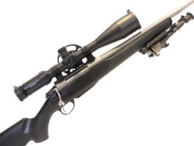 Tikka T3 .223 bolt action rifle with moderator, serial number 406625, 23 inch barrel, stainless