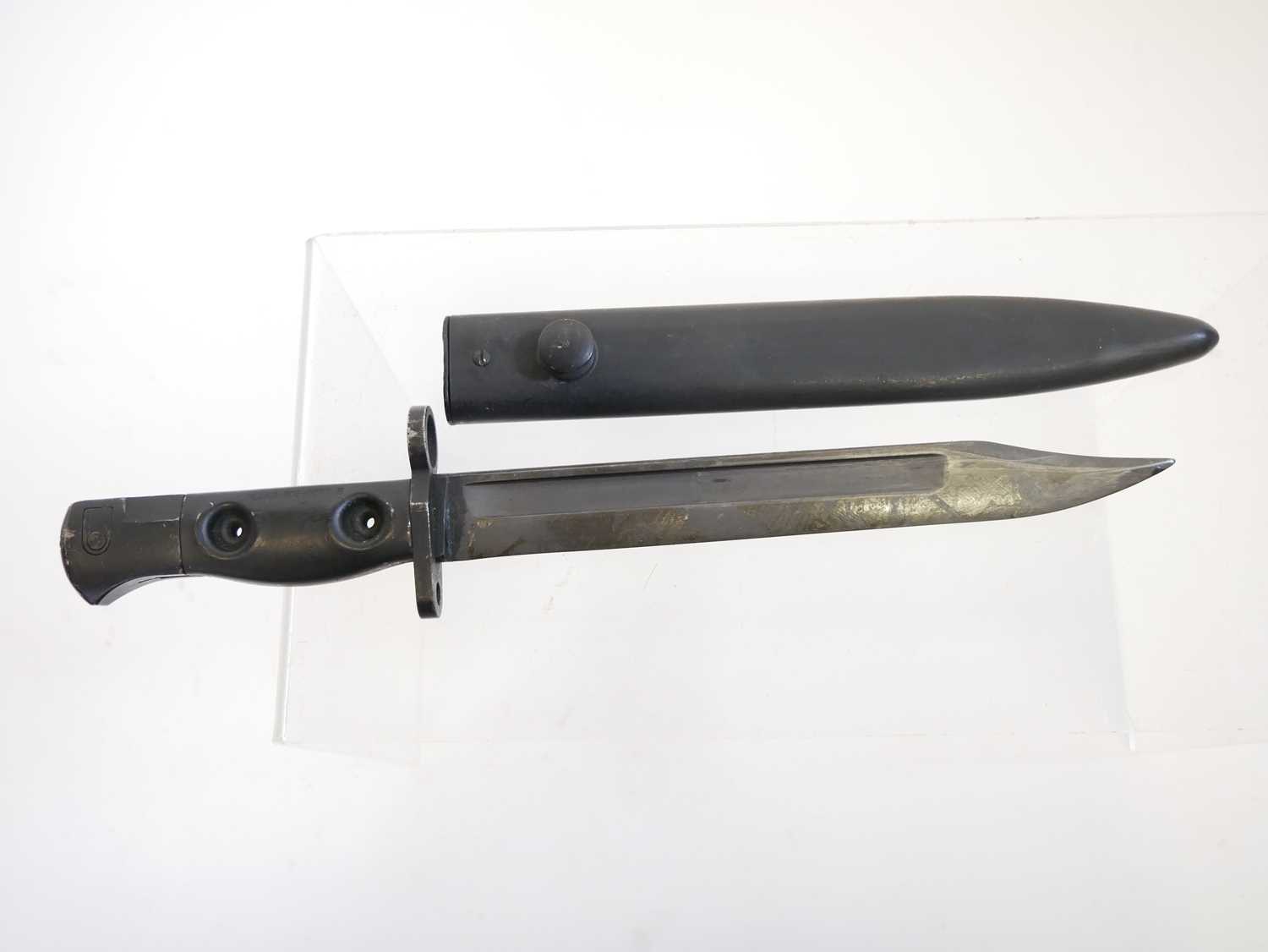 L1A3 SLR bayonet and scabbard, finished black all over, the grip stamped L1A3 960-0257 B. Buyer must - Image 2 of 7