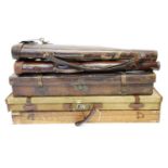 Five gun cases, to include an oak and brass case (no interior) a canvas and leather case, an all