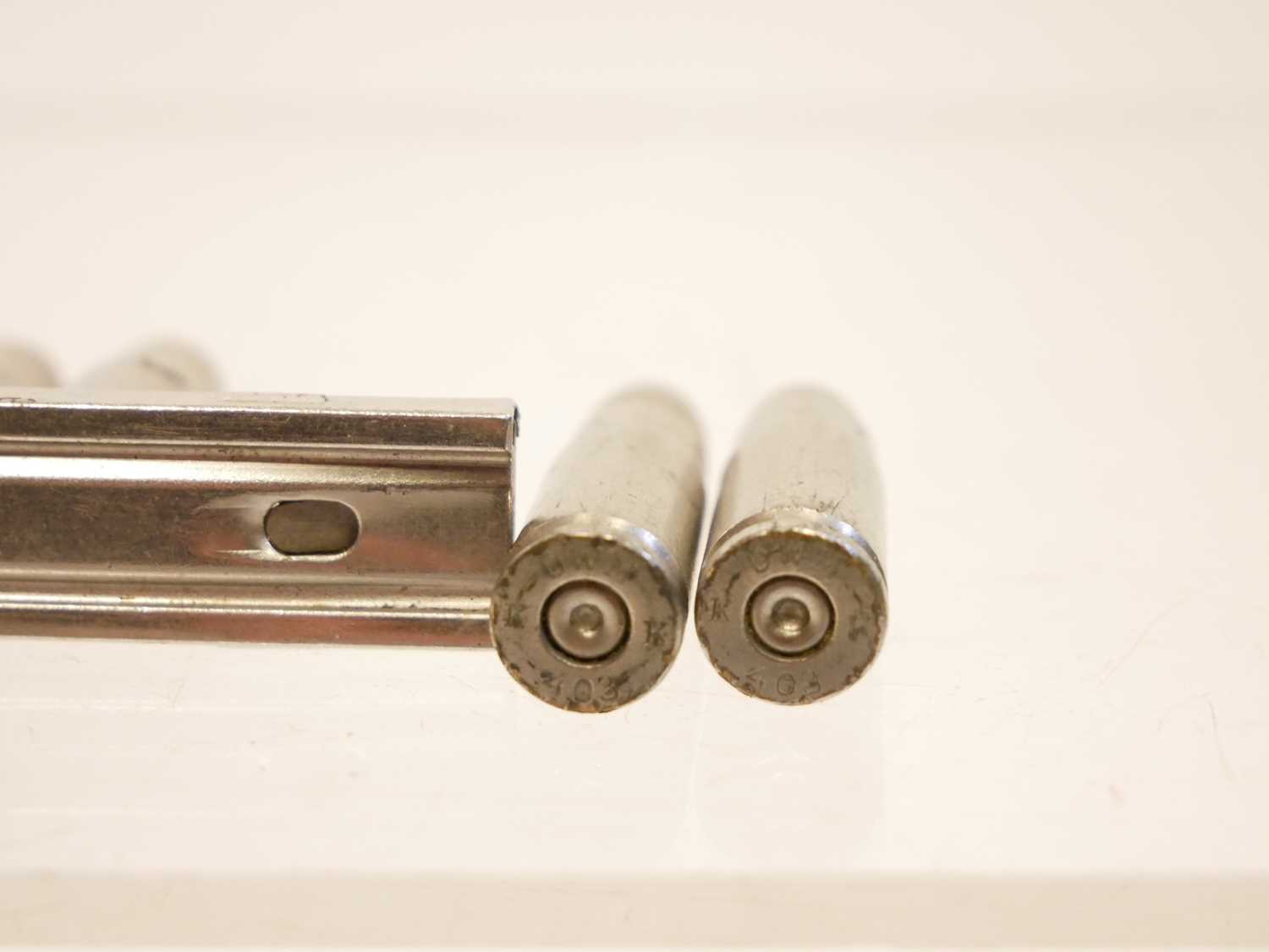 Ten nickel-plated DWM 7.63mm Mauser M1896 “Broomhandle” pistol dummy cartridges in DWM stripper - Image 3 of 3