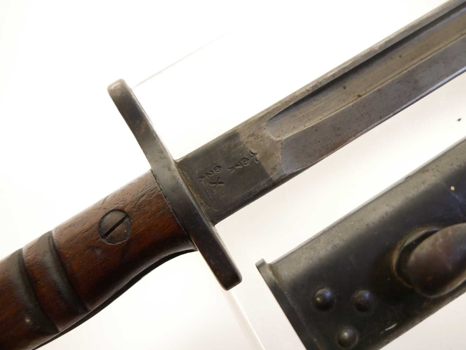 P14 Remington bayonet and scabbard, the ricasso with makers mark, 1913 and 2,16 date. Buyer must - Image 3 of 7