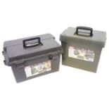 Two MTM range boxes full of black powder shooting equipment, including patches, wads, wad punches,