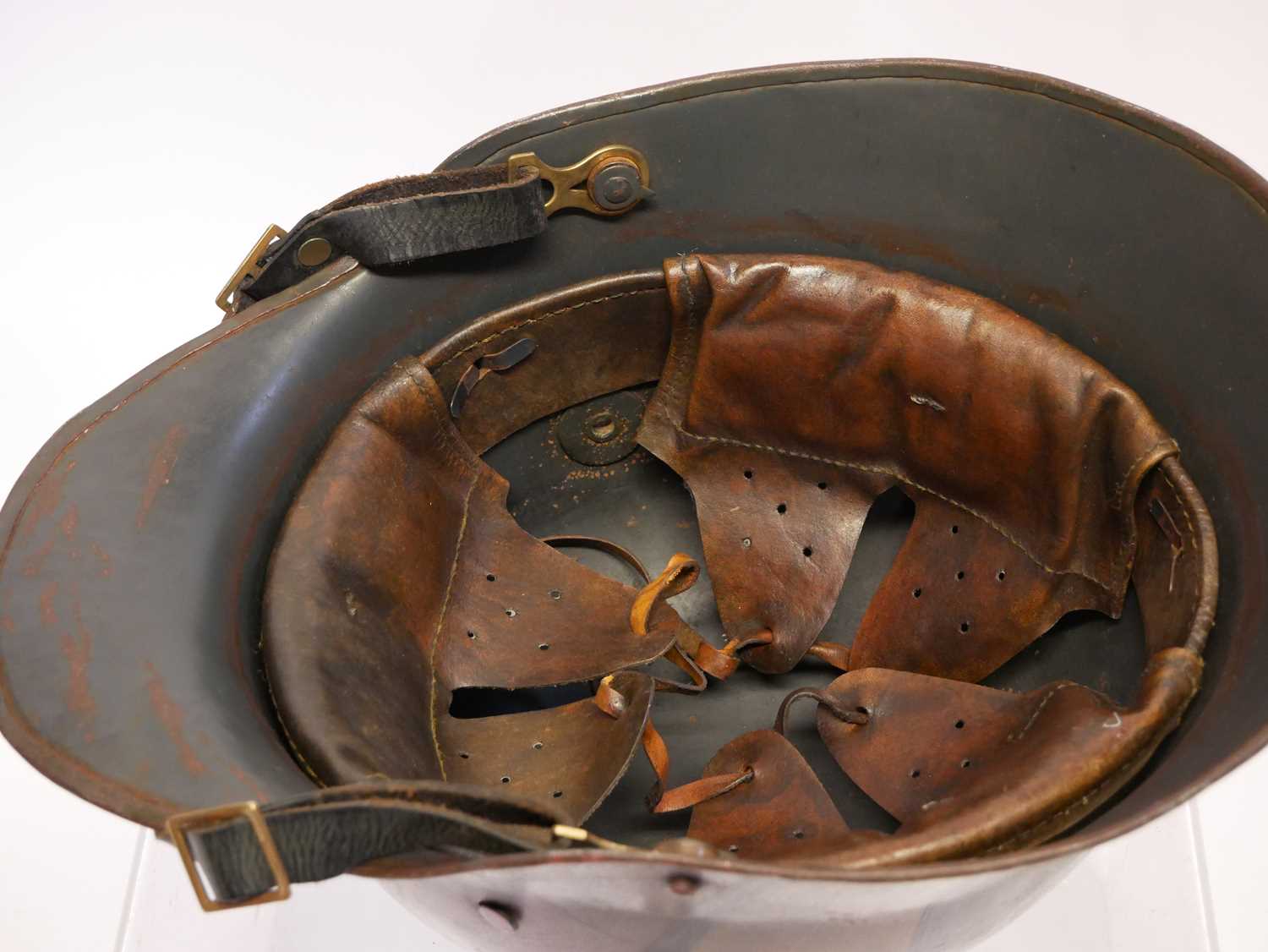German WWI M16 helmet, with leather liner, the originality of the turtle shell paintwork and Machine - Image 7 of 7