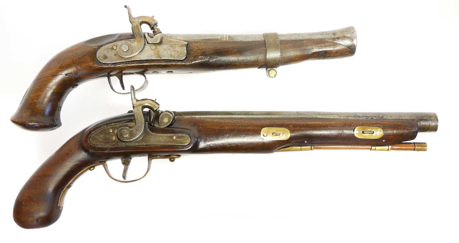 Two composed percussion pistols, with antique barrels and period locks one signed W. Haynes Reading,