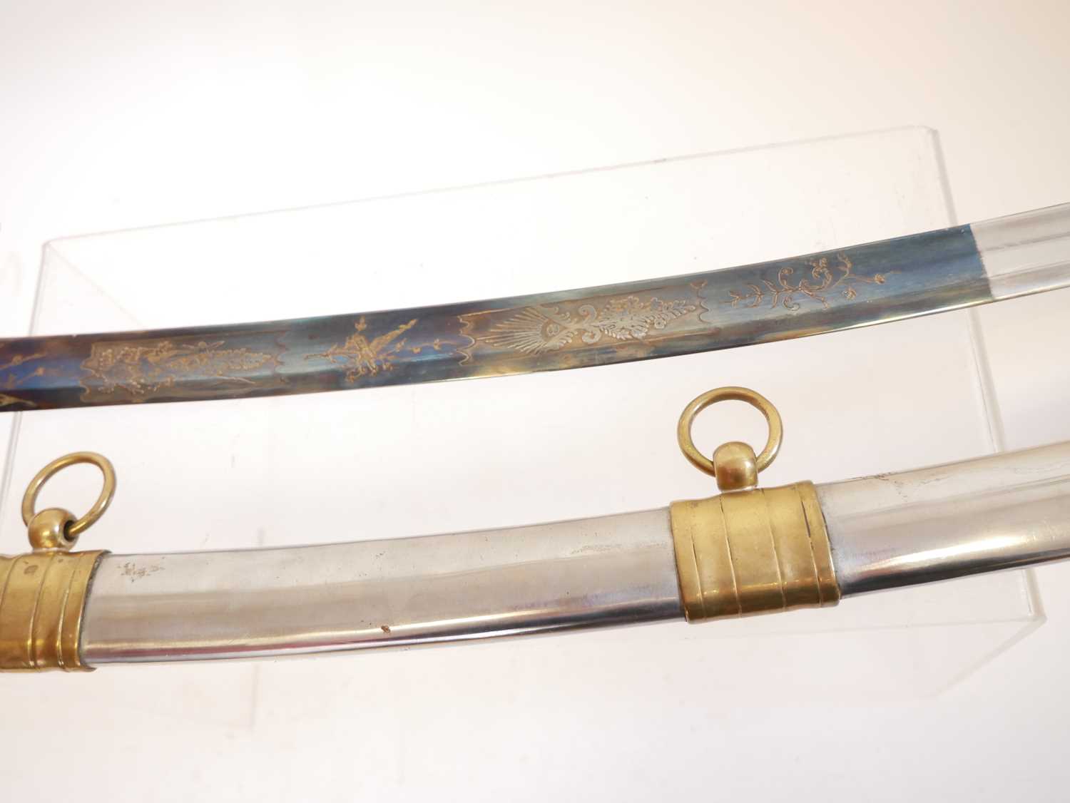 Reproduction copy of a French Cavalry sabre, with blue and gilt etched blade. Buyer must be over the - Image 4 of 7