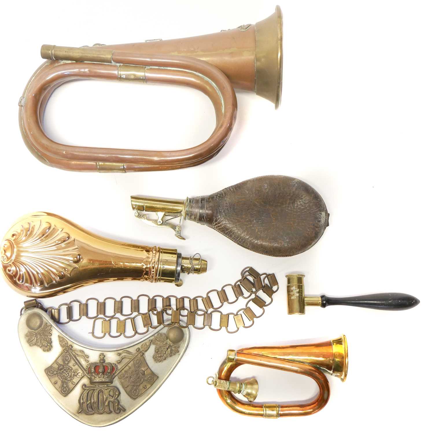 Collection of items, to include a Royal Artillery bugle, one other miniature bugle, a powder