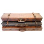 Three leather shotgun cases, one labelled Samuel Ebrall of Shrewsbury to fit 28inch barrels, another