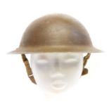 British WWII MkII Brodie or 'Tommy' helmet, dated 1942 and stamped C.L/C 44. 31cm long