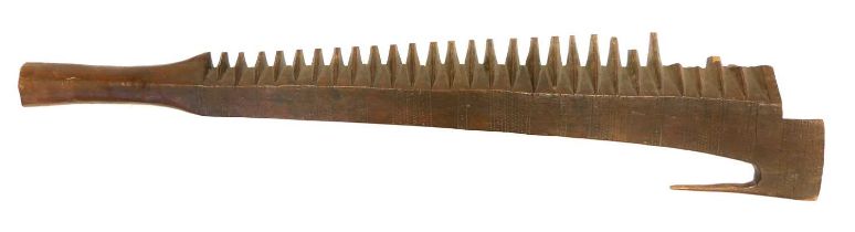Oceanic Samoan Island war club, with spine back and carved with bands of triangles. Provenance: From
