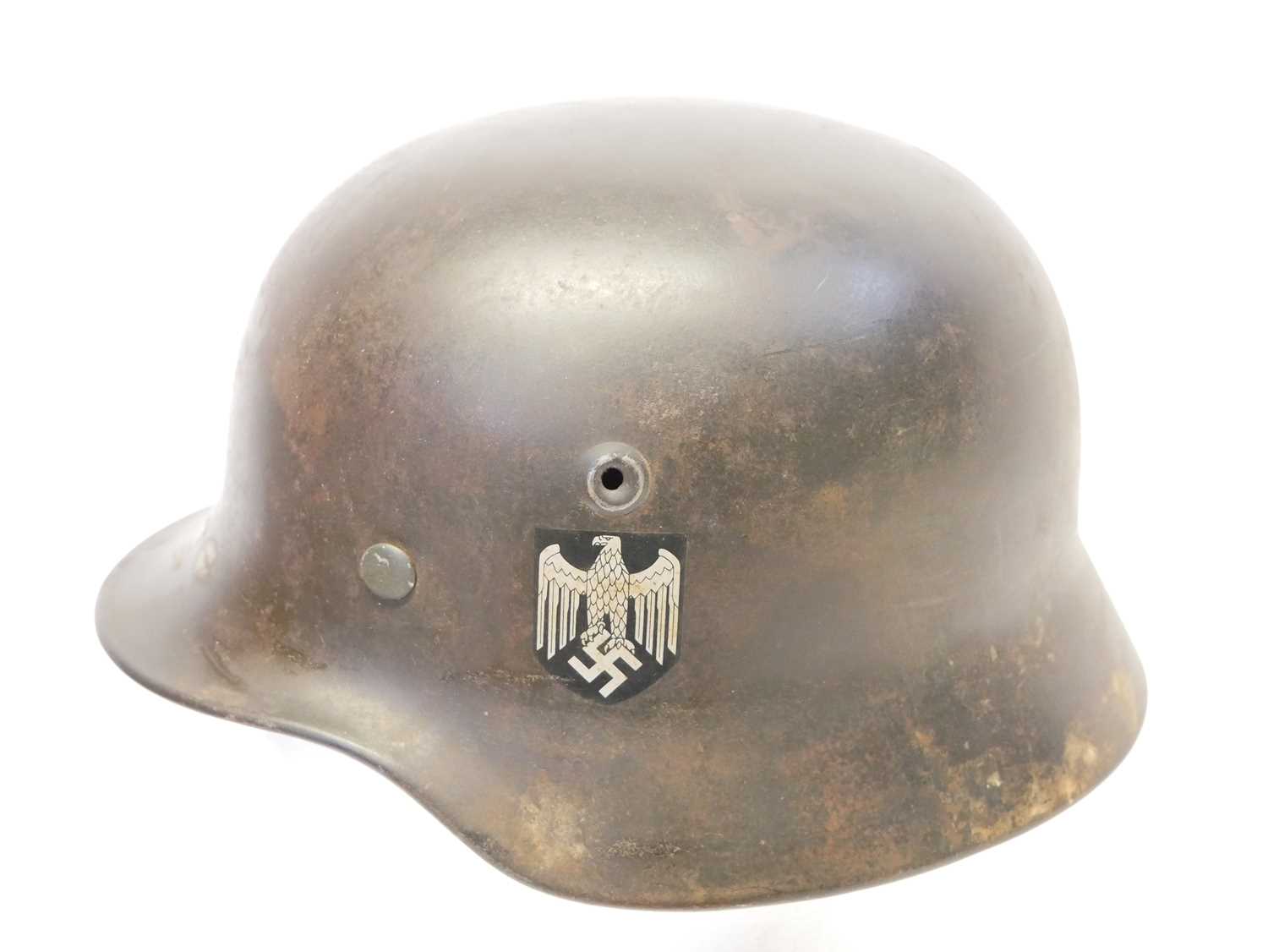 German WWII M40 helmet, stamped Q64 DN44, the originality of the decals is not known, the helmet - Image 3 of 9