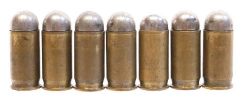 Seven rare inert British .455 Mk I cartridges for Webley or Colt pistols.