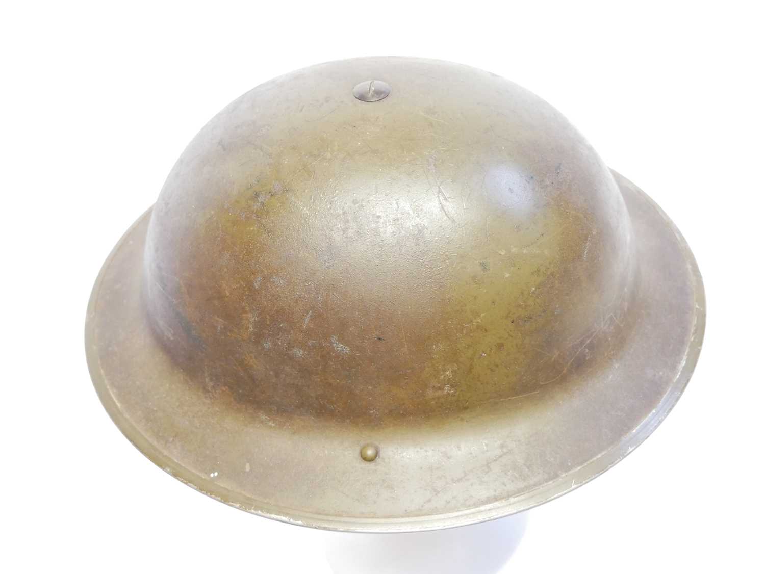 British WWII MkII Brodie or 'Tommy' helmet, dated 1942 and stamped C.L/C 44. 31cm long - Image 5 of 9