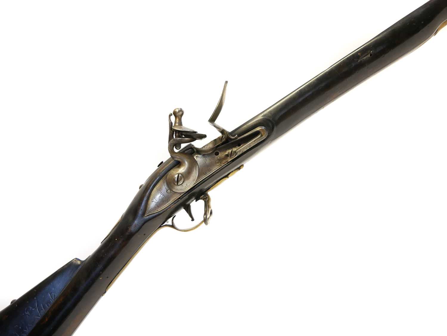 The stock and action of a reproduction long land Brown Bess musket, the lock signed Jordan 1742