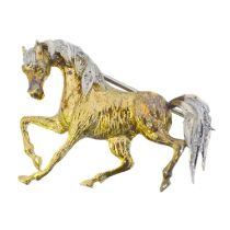 An 18ct gold diamond horse brooch.