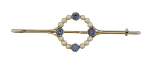 An early 20th century sapphire and seed pearl bar brooch.