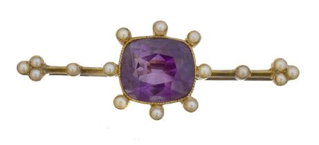 An early 20th century amethyst and split pearl brooch.