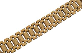 A 9ct gold bracelet by Smith & Pepper.