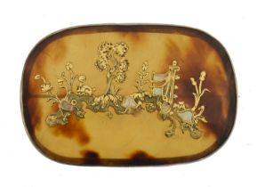 A Chinese inlaid tortoiseshell brooch.