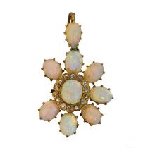 A Victorian opal and diamond pendant.