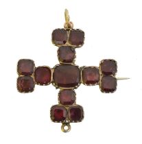 A 19th century foil back garnet cross brooch.