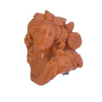 A 19th century carved coral brooch.