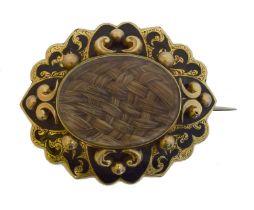 A Victorian mourning brooch.