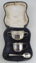 A cased silver three piece christening set, engraved with initials, weight 6oz