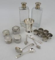 A set of six silver circular salts, together with a silver christening mug, four silver and glass