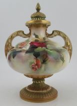 A Royal Worcester covered bulbous vase, decorated with roses by R Austin, shape No 2032, finial