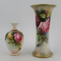 A Royal Worcester spill vase, decorated with roses by Spilsbury, shape No G923, height 8.5ins,