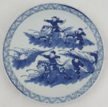 A 19th century Chinese porcelain plate, decorated with boys on horse back and other figures hunting,