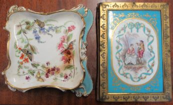 A 19th century porcelain stand, of square form, decorated with butterflies and flowers, to a