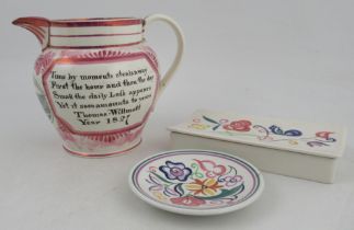 A 19th century English porcelain luster jug, printed with a view of Ironbridge and text, height 7ins