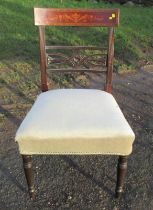 A 19th century mahogany dining chair, the top back rail inlaid with urns and flower swags