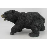 A modern bronze effect model, of a bear