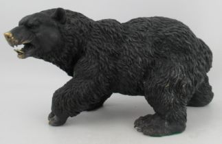 A modern bronze effect model, of a bear