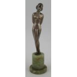 Lorenzl, a patinated bronze figure, of a nude girl with arms crossed behind her back, height 7.5ins