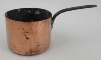 A 19th century copper sauce pan, diameter 4.75ins