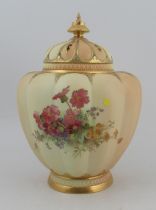 A Royal Worcester blushed ivory pot pourri, with associated cover, decorated with flowers, lacking