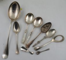 A mid 18th century silver large serving spoon, together with serving spoon, both Continental, a