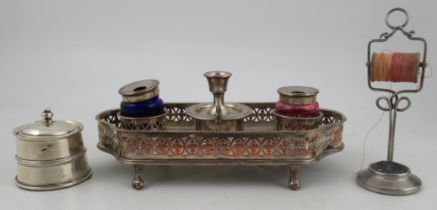 A Sheffield plate desk stand, with pierced gallery border, fitted with two coloured glass inkwells