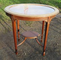 An oval Edwardian bijouterie table, raised on square turned legs, united by stretchers, diameter